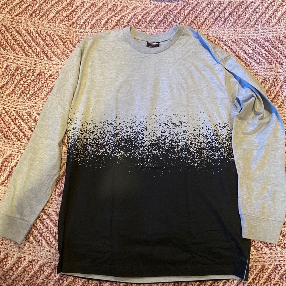 gray and black graphic long sleeve tshirt